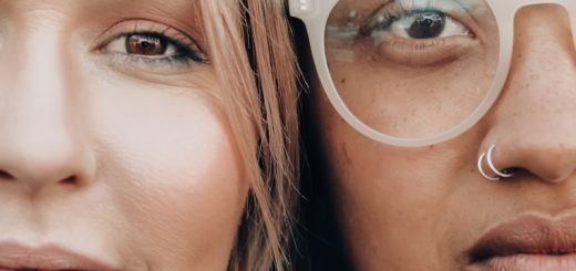 woman wearing white framed eyeglasses