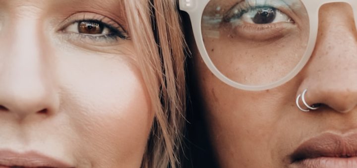 woman wearing white framed eyeglasses